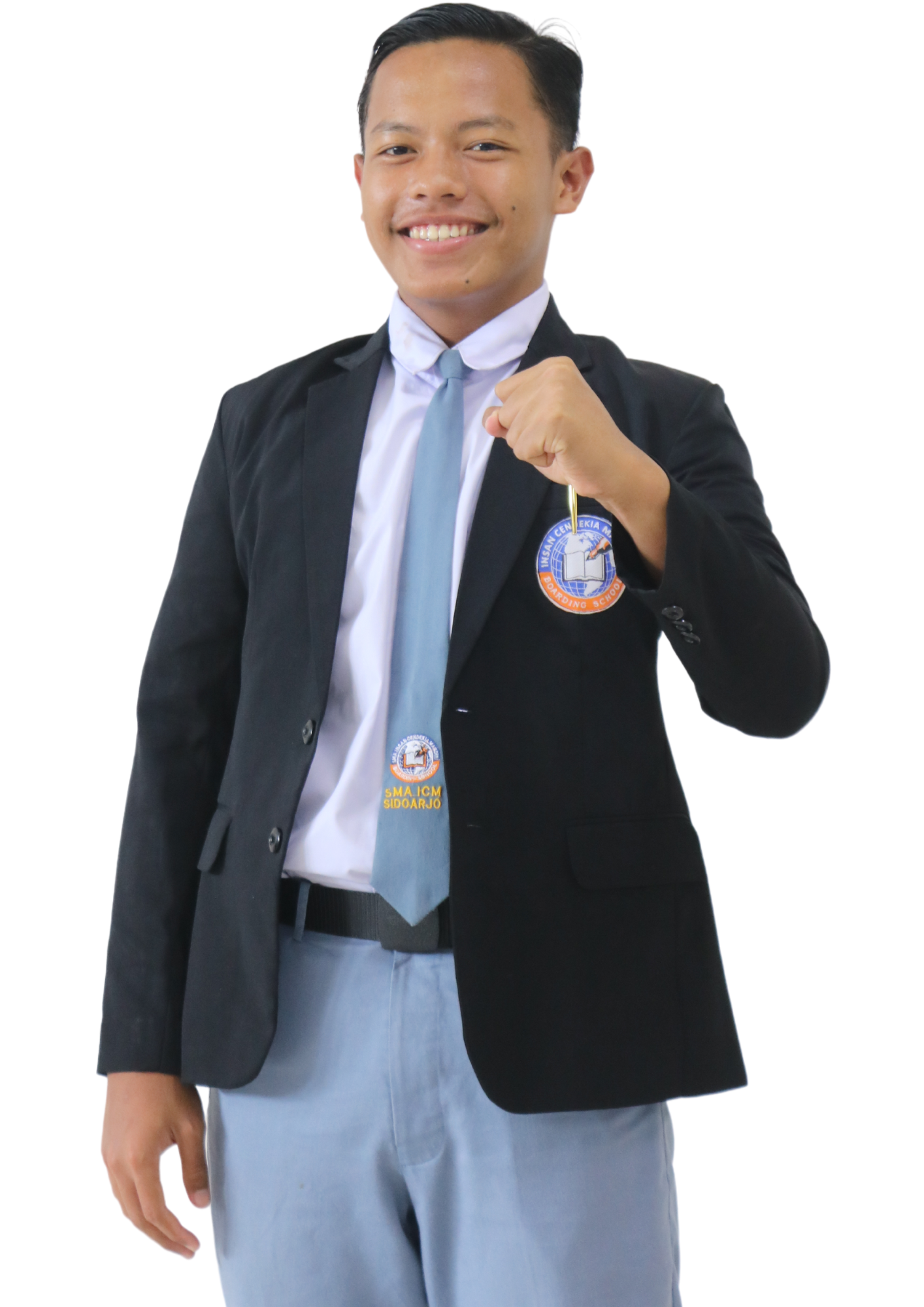 Man with curly hair wearing green checkered shirt and backpack holding notebooks giving thumbs up